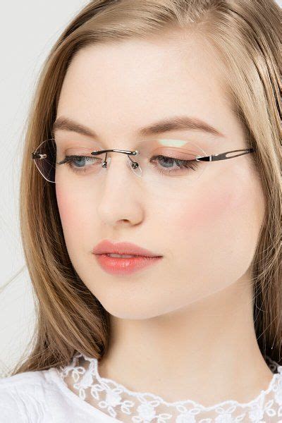 small oval rimless glasses.